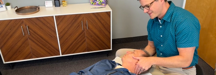 Chiropractor Brighton MA Ty Crabtree Adjusting Neck